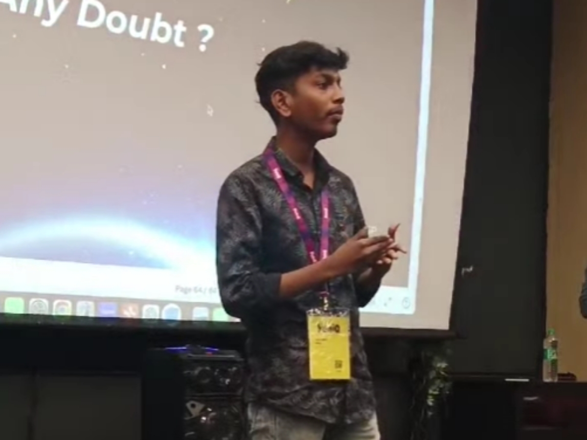 Boobesh AG speaking at a tech conference